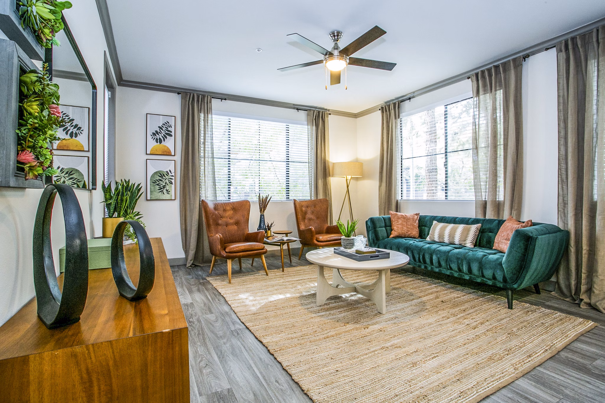 Spacious living room with modern decor in The Alcove Apartments, luxury living at its finest
