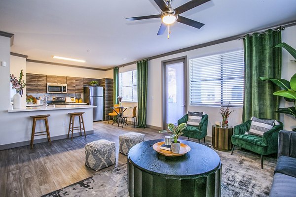 Modern living room with stylish furnishings at The Alcove Apartments