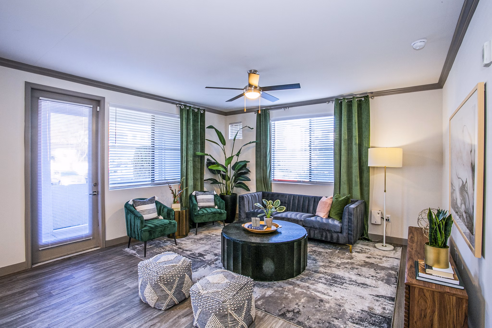 Modern living room with elegant furnishings at The Alcove Apartments, highlighting luxury in urban living spaces