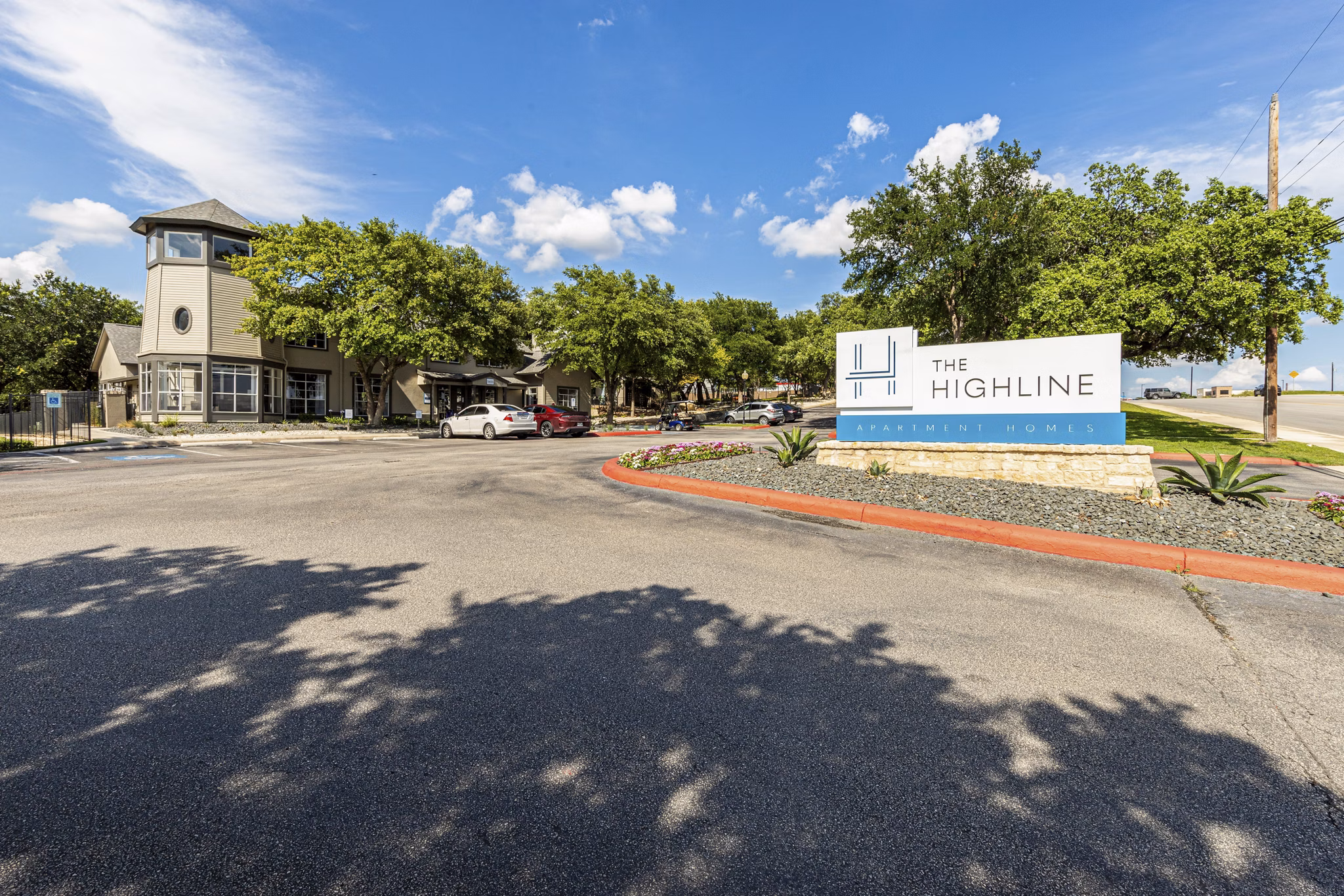 Signage at The Highline Apartments in luxury community highlighting premium living spaces and amenities