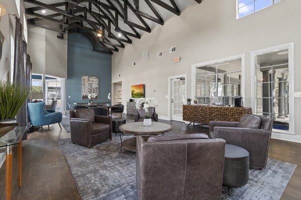 Elegant clubhouse lobby featuring modern decor in The Highline Apartments, offering a luxurious community space for residents