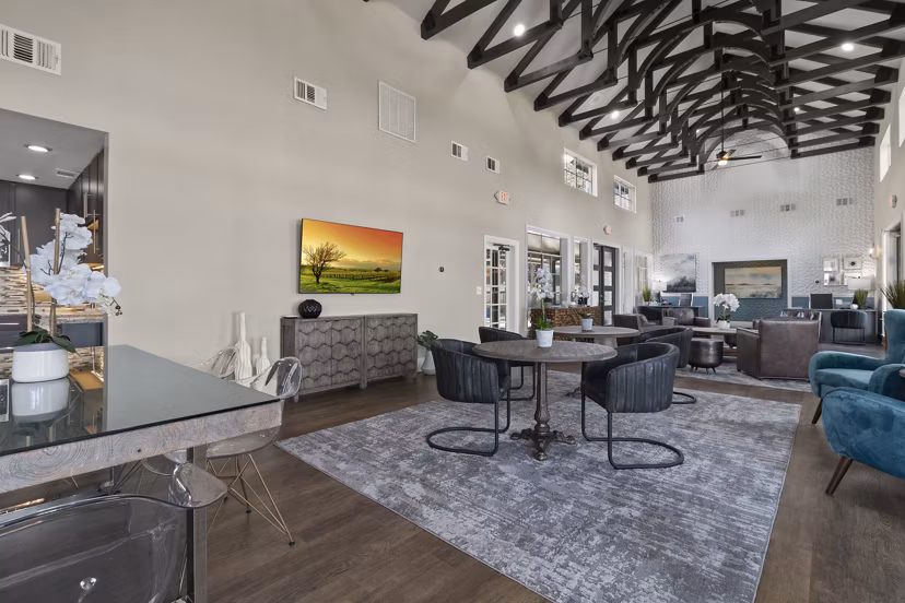 Welcoming clubhouse/lobby with modern decor at The Highline Apartments, a luxury living space by Greystar