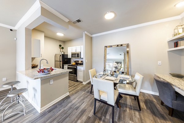 Dining room with modern decor and sleek finishes at The Highline Apartments