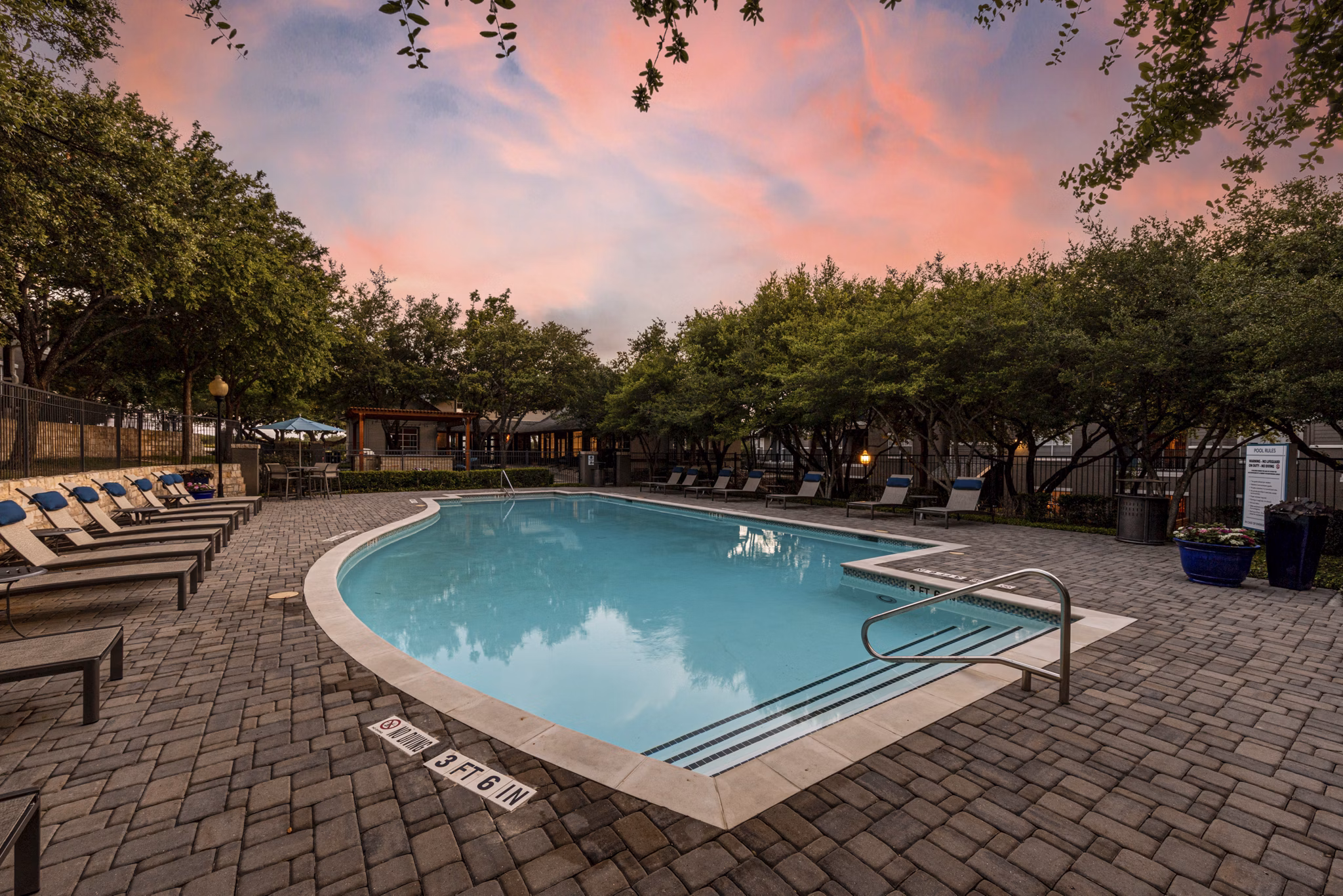 Inviting pool at The Highline Apartments, offering relaxation and luxury for residents