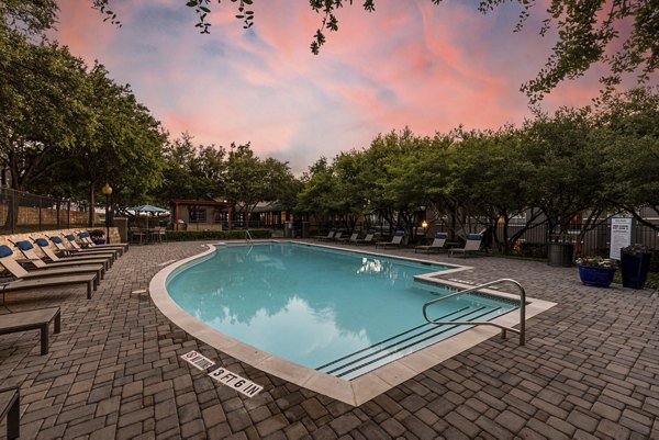 Inviting pool at The Highline Apartments, offering relaxation and luxury for residents