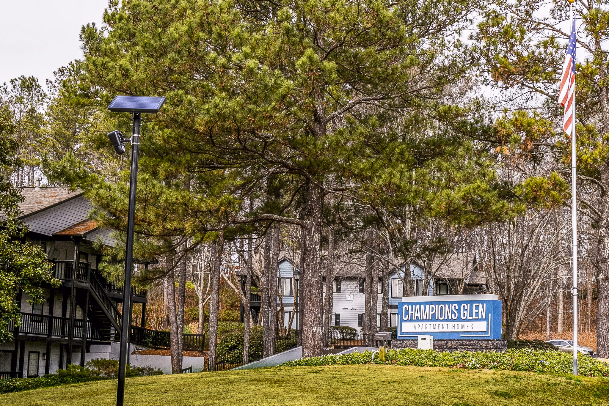 Champions Glen Apartments: Elegant signage at luxury apartments near local attractions