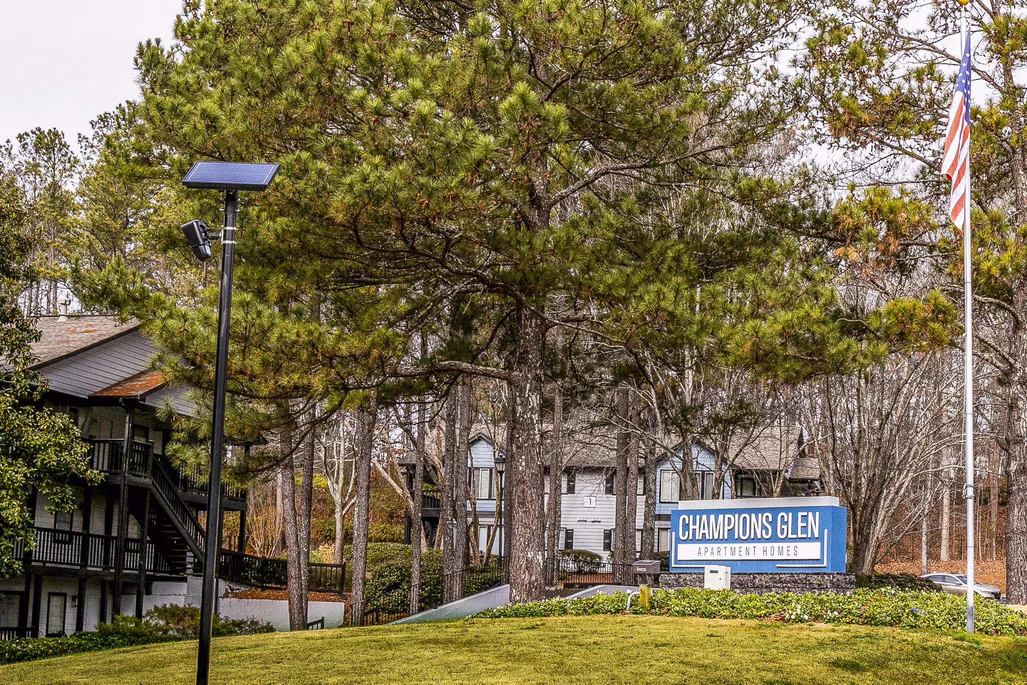 Champions Glen Apartments: Elegant signage at luxury apartments near local attractions
