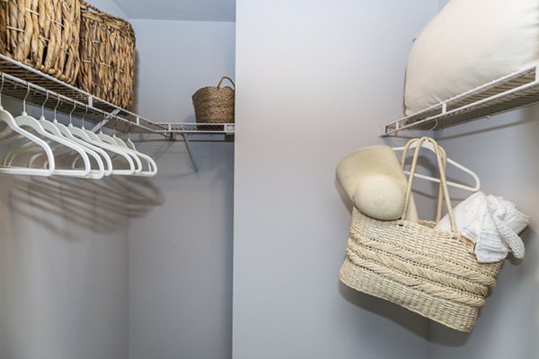 Bedroom closet with custom shelving in Champions Glen Apartments