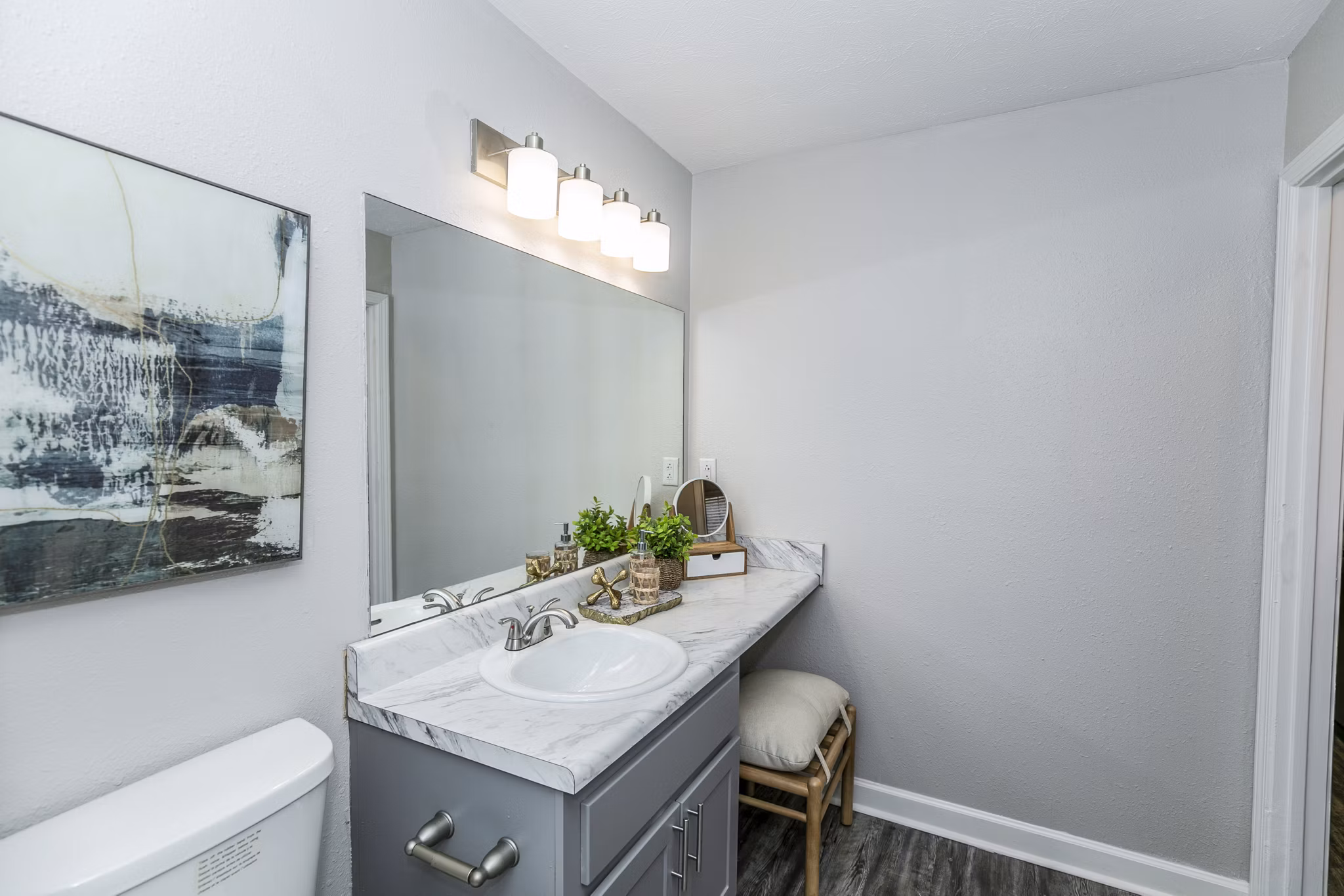 Modern bathroom with sleek fixtures at Champions Glen Apartments