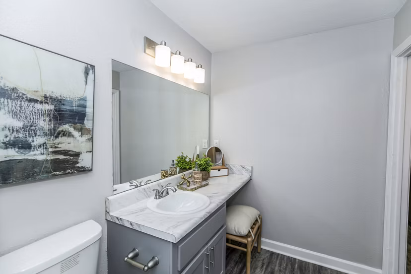 Modern bathroom with sleek fixtures at Champions Glen Apartments