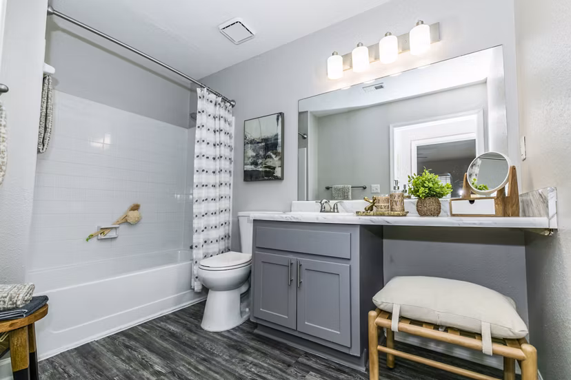 Spacious bathroom with modern fixtures at Champions Glen Apartments