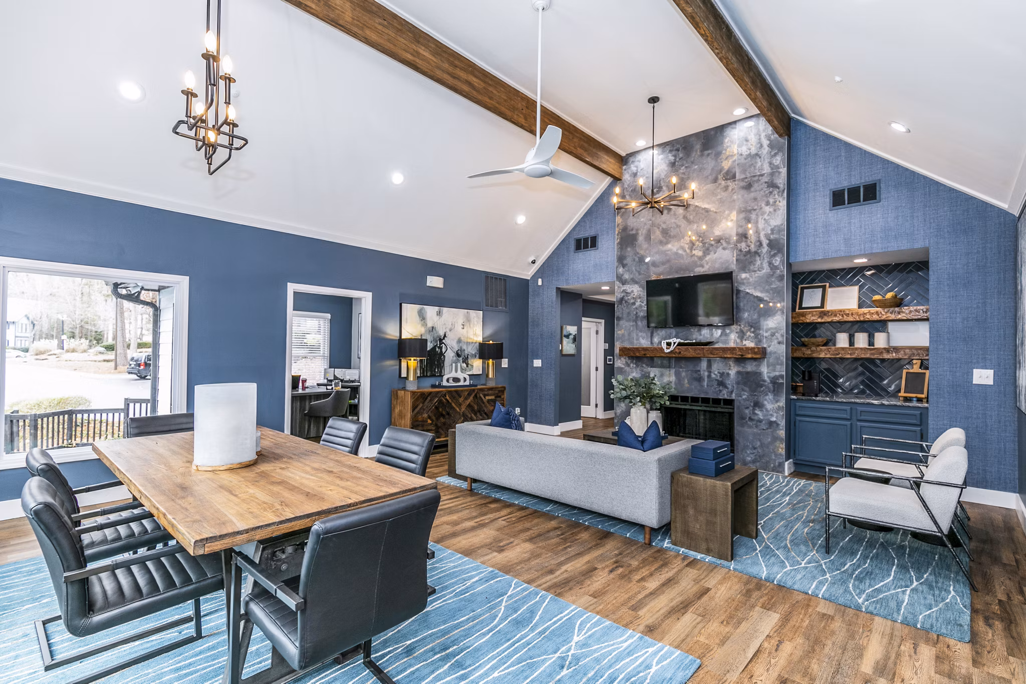 Clubhouse featuring modern furnishings and social spaces at Champions Glen Apartments