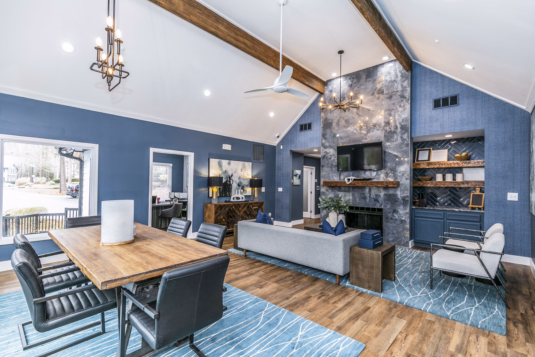 Clubhouse featuring modern furnishings and social spaces at Champions Glen Apartments