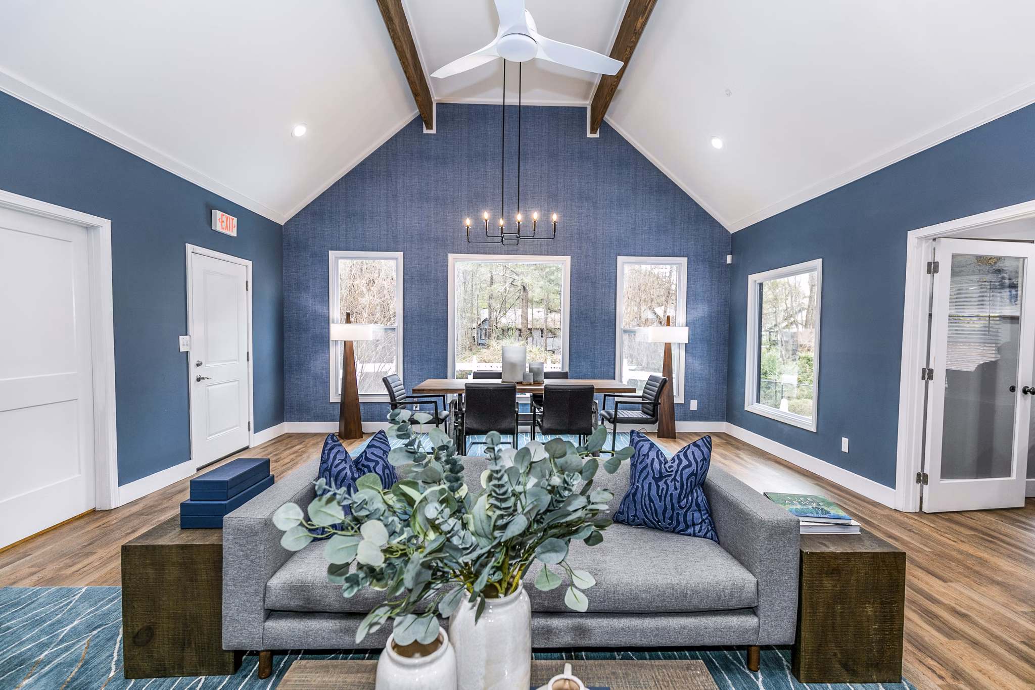 Clubhouse at Champions Glen Apartments featuring a spacious event area with modern decor