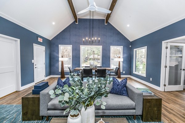 Clubhouse at Champions Glen Apartments featuring a spacious event area with modern decor