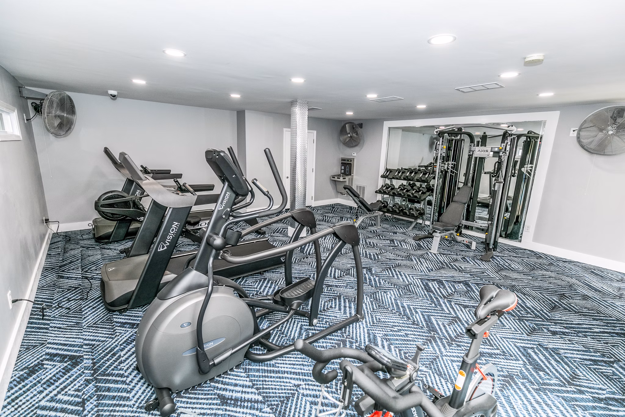 State-of-the-art fitness center at Champions Glen Apartments with modern equipment for an active lifestyle