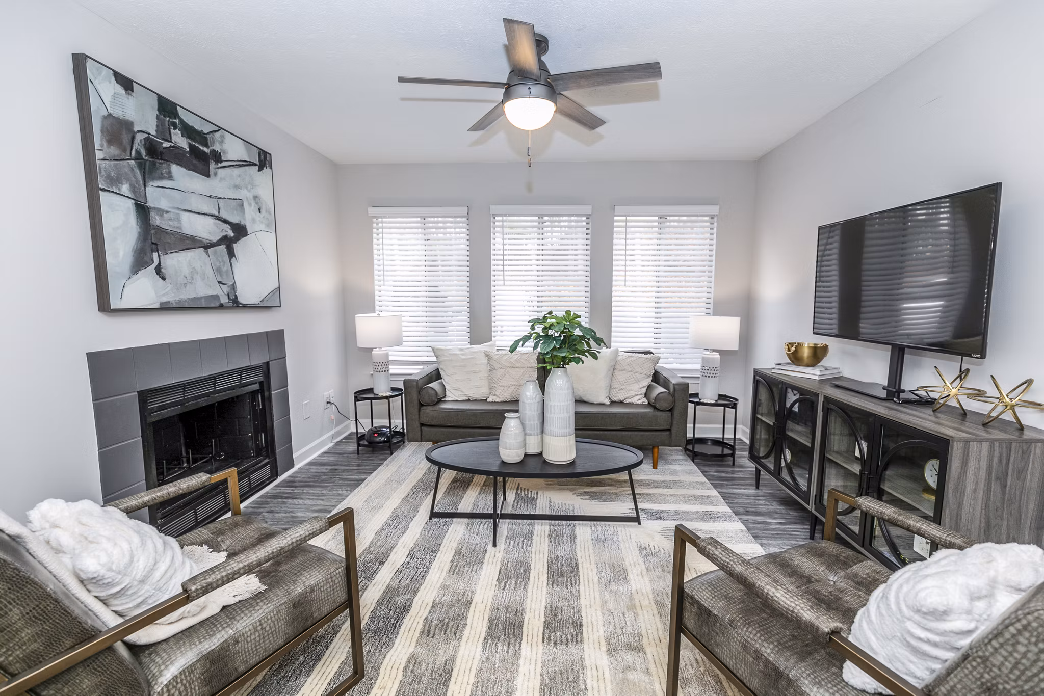 Spacious living room with modern decor at Champions Glen Apartments in Atlanta