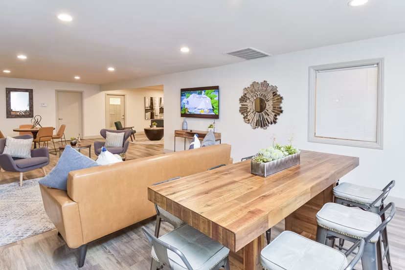 Clubhouse with modern furnishings and social areas at Vineyard Gardens Apartments