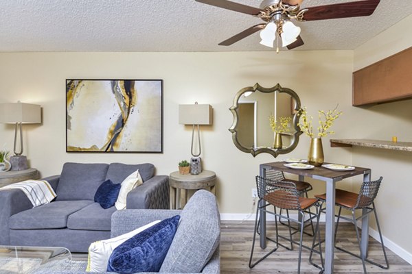 Dining and living room with modern furnishings at Vineyard Gardens Apartments, Greystar luxury apartments in a vibrant community