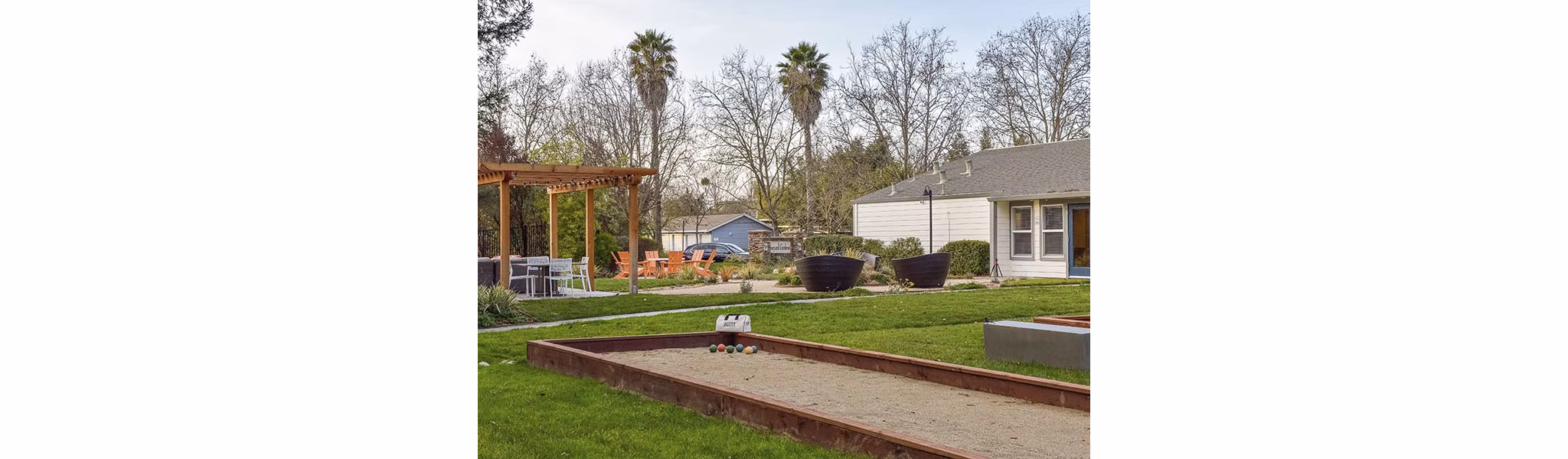 Recreational area with lush greenery at Vineyard Gardens Apartments luxury community