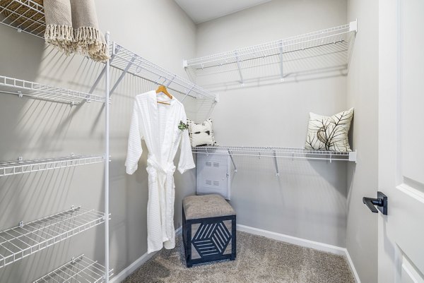 Spacious bedroom closet with built-in shelving at River Oaks Landing Apartments