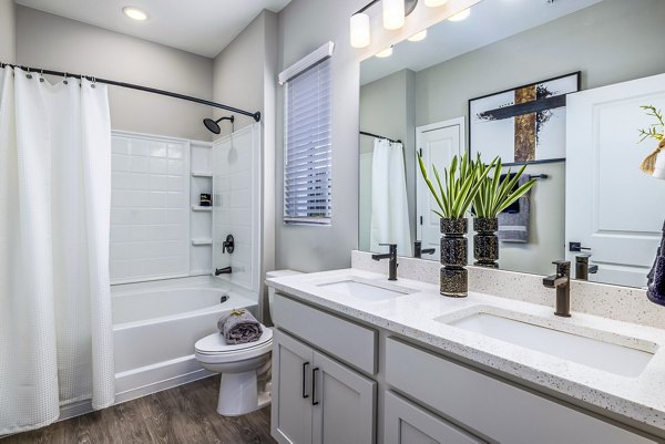 River Oaks Landing: Luxury bathroom featuring modern fixtures and sleek design