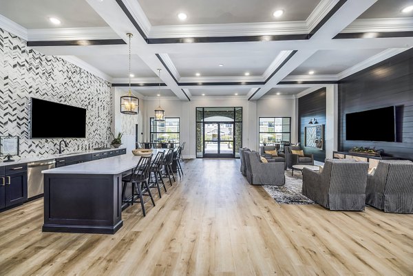 Clubhouse with modern decor at River Oaks Landing Apartments, designed for social gatherings and leisure activities