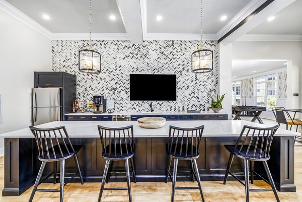 Clubhouse featuring modern design and upscale amenities at River Oaks Landing Apartments