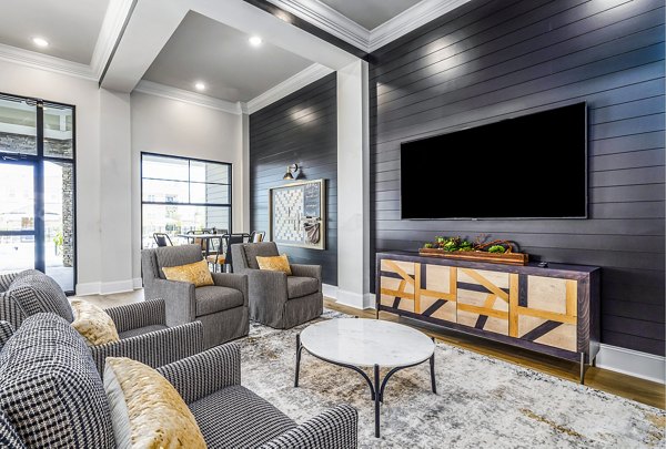 Stylish clubhouse with modern furnishings at River Oaks Landing Apartments
