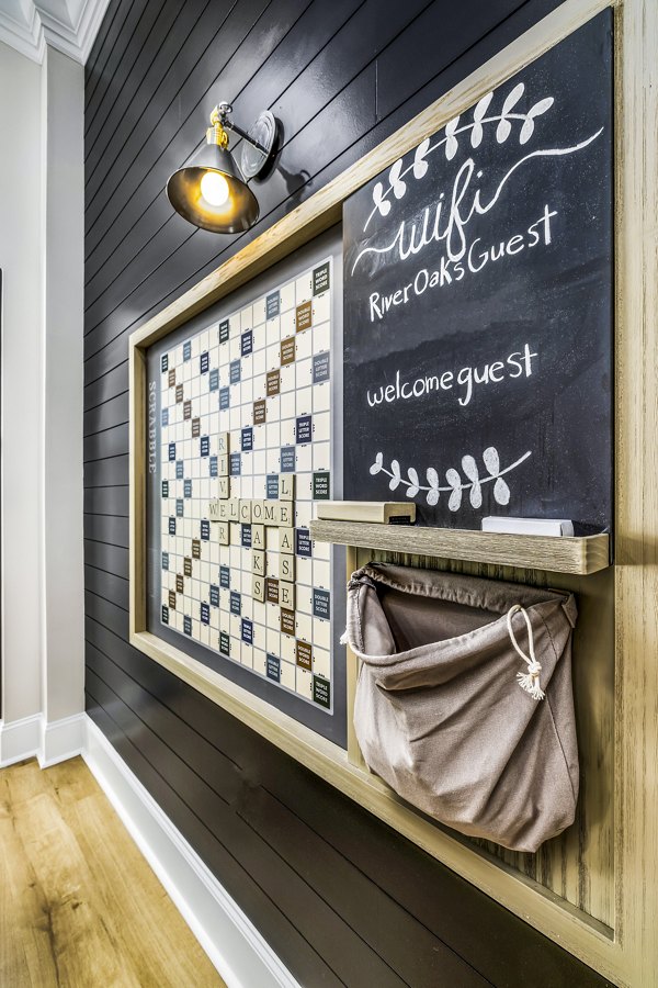 River Oaks Landing: Elegant clubhouse with modern decor in luxury apartment community