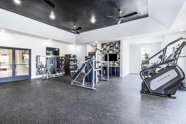 State-of-the-art fitness center with modern equipment at River Oaks Landing Apartments, ensuring a healthy lifestyle for residents