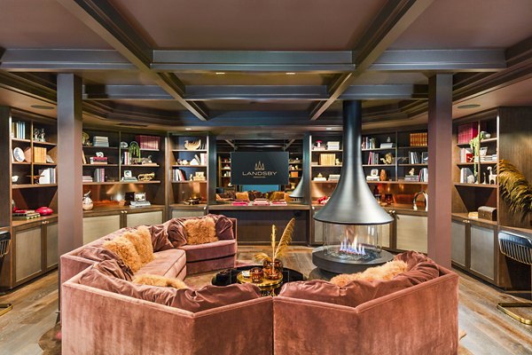 Modern clubhouse interior featuring sleek design and spacious seating at Landsby Apartments