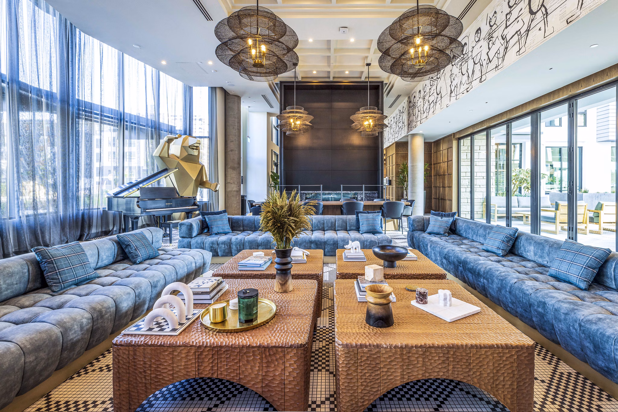 Landsby Apartments: Modern clubhouse lobby with contemporary seating and design elements