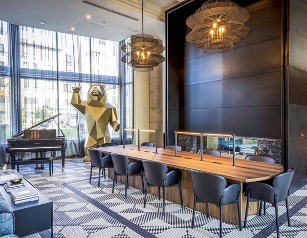 Clubhouse with stylish seating and modern decor in Landsby Apartments