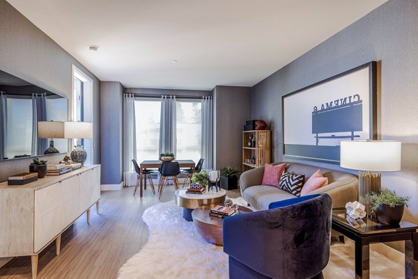 Modern living room with open layout and stylish decor in Landsby Apartments