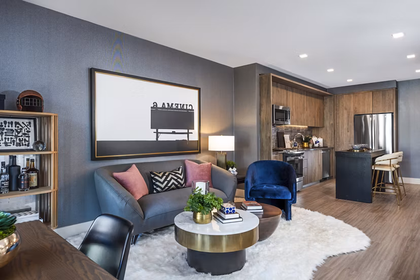 Spacious living room with modern decor at Landsby Apartments, luxury living by Greystar