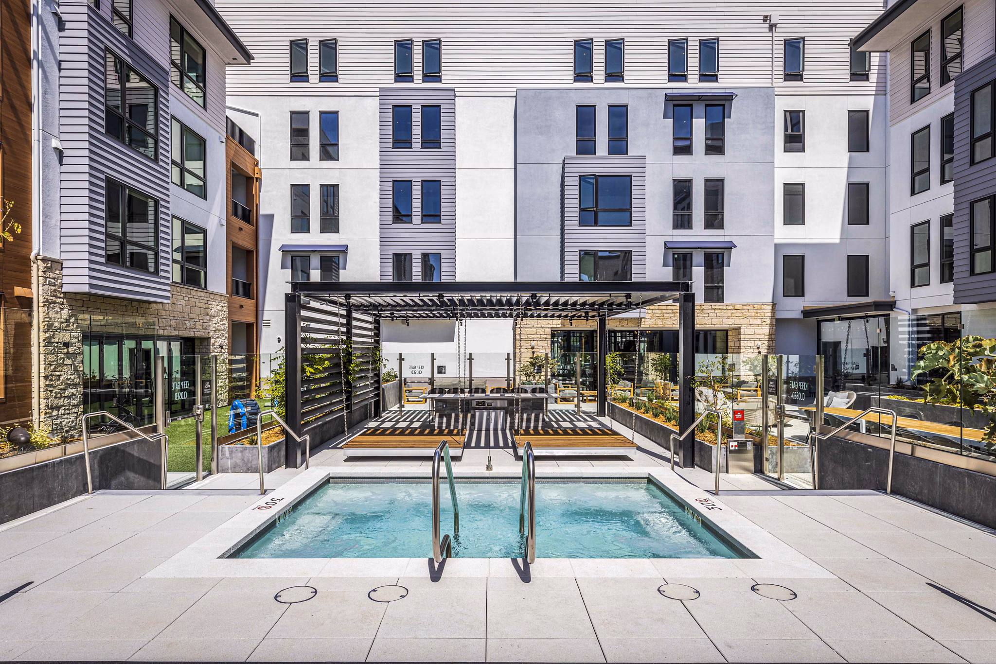 Resort-style pool at Landsby Apartments offering luxury amenities for residents