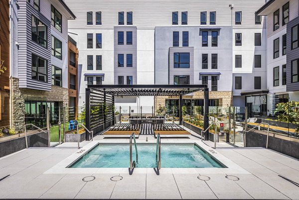 Resort-style pool at Landsby Apartments offering luxury amenities for residents