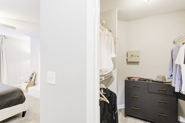Spacious bedroom with modern design at Avana Collins Creek Apartments