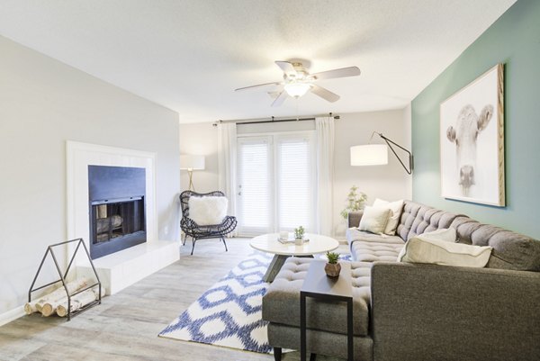 Cozy living room with modern decor at Avana Collins Creek Apartments