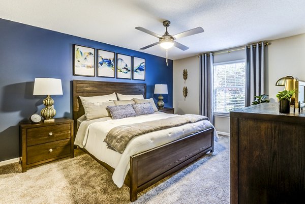 Cozy bedroom featuring modern decor at Avana South Oaks Apartments