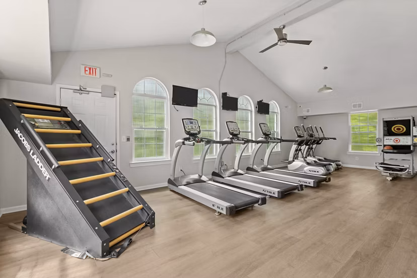 Modern fitness center with state-of-the-art equipment at Avana South Oaks Apartments, ideal for luxury living and wellness enthusiasts