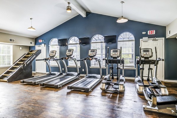 Modern fitness center with state-of-the-art equipment at Avana South Oaks Apartments, ideal for luxury living and wellness enthusiasts