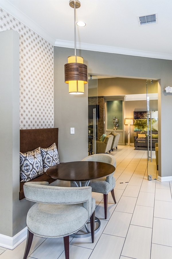 Clubhouse with elegant lobby design at Pinnacle at Town Center Apartments