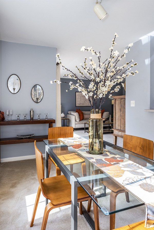 Dining room with elegant decor and modern furnishings at Pinnacle at Town Center Apartments