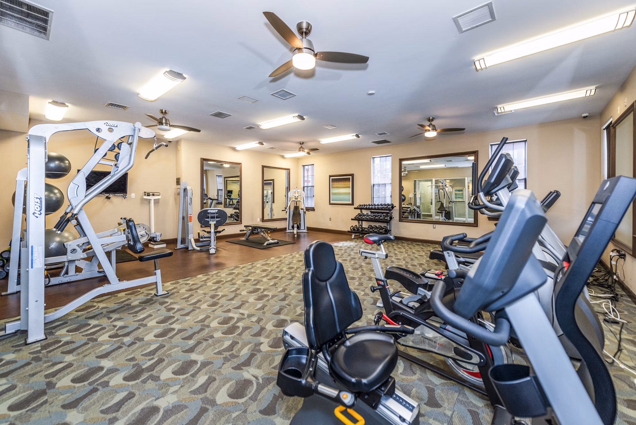 Fitness center with modern equipment at Pinnacle at Town Center Apartments
