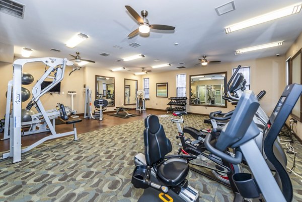 fitness center at Pinnacle at Town Center Apartments
