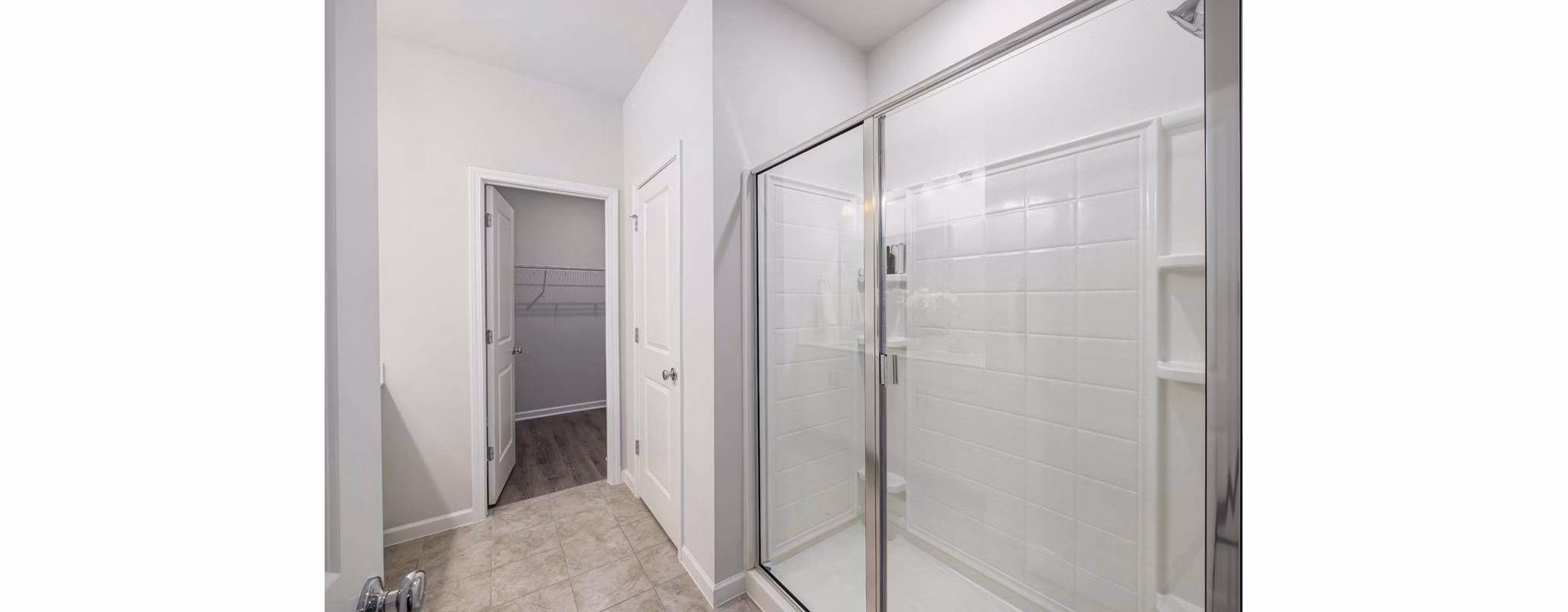 Modern bathroom featuring elegant fixtures at Ashford Townes Apartments