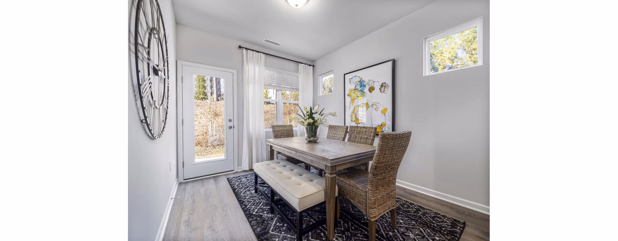 Dining area with modern fixtures and cozy seating at Ashford Townes Apartments Luxurious ambiance in this Greystar-managed community