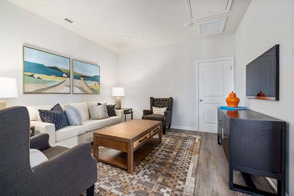 Modern living room with stylish decor at Ashford Townes Apartments